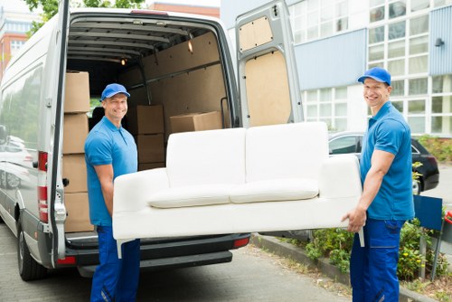 Home moving service in Merton with boxes and furniture ready for transport