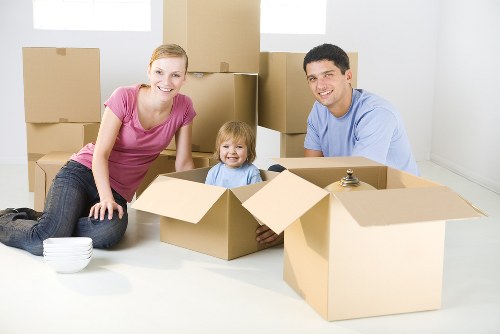 Sturdy moving boxes and packing supplies arranged for a home move in Merton