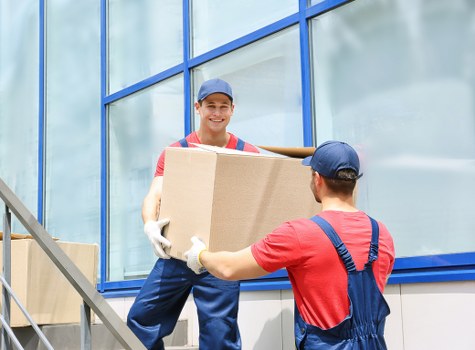 Careful loading of household items for a Merton moving service