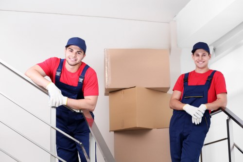 Office furniture removals in Merton with desks and chairs being relocated
