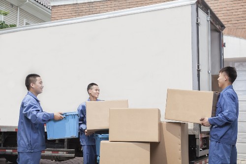 Office furniture dismantling and reassembly during office removals in Merton