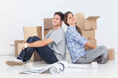 Office relocation team moving commercial equipment in Merton