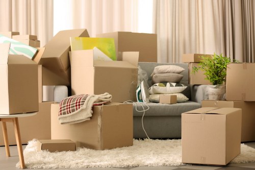 Professional office relocation services preparing equipment for transport