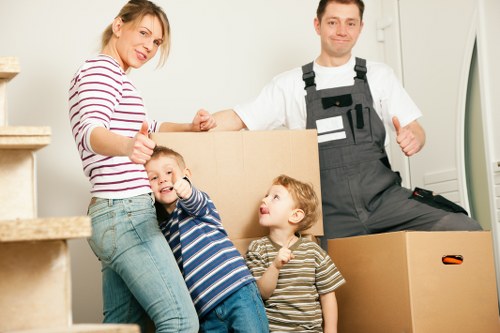 Careful loading of household items for a Merton move